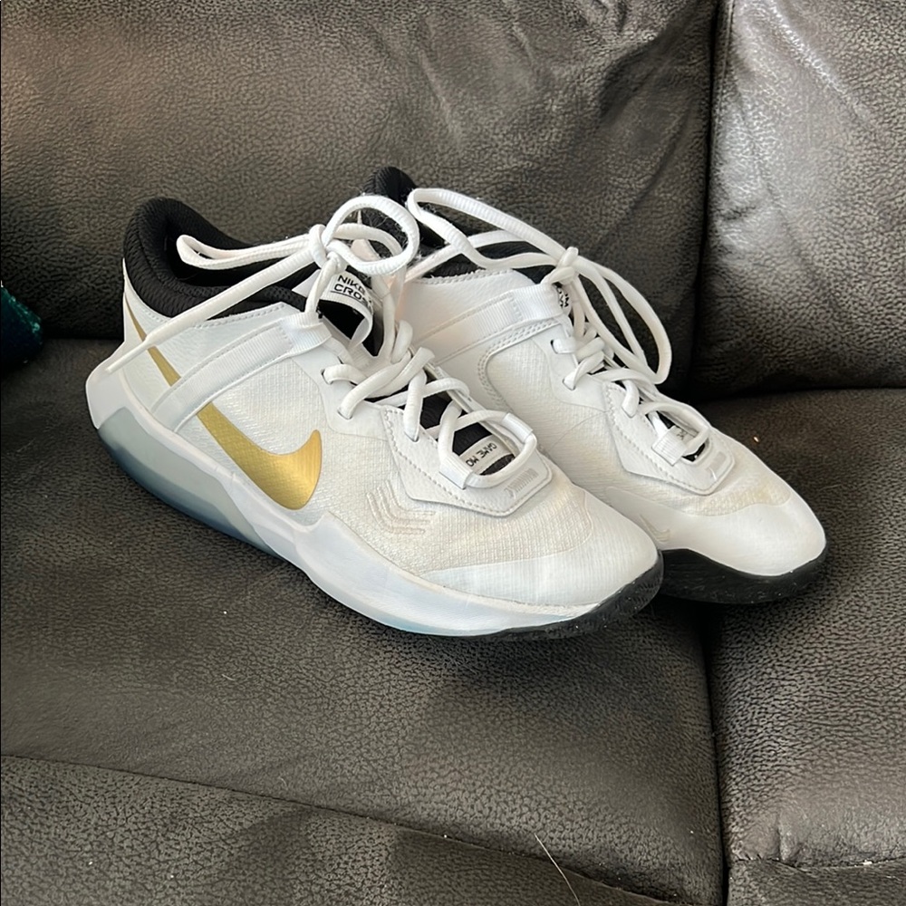 Nike White and Gold Minimalist Sneakers